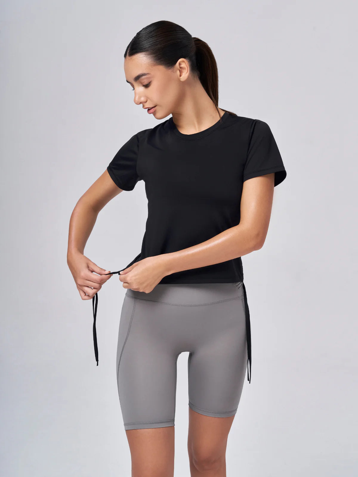 Remera negra Mujer ajuste costado